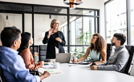 Woman leading a board meeting