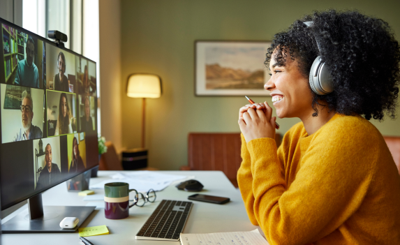Woman on a work call smiling